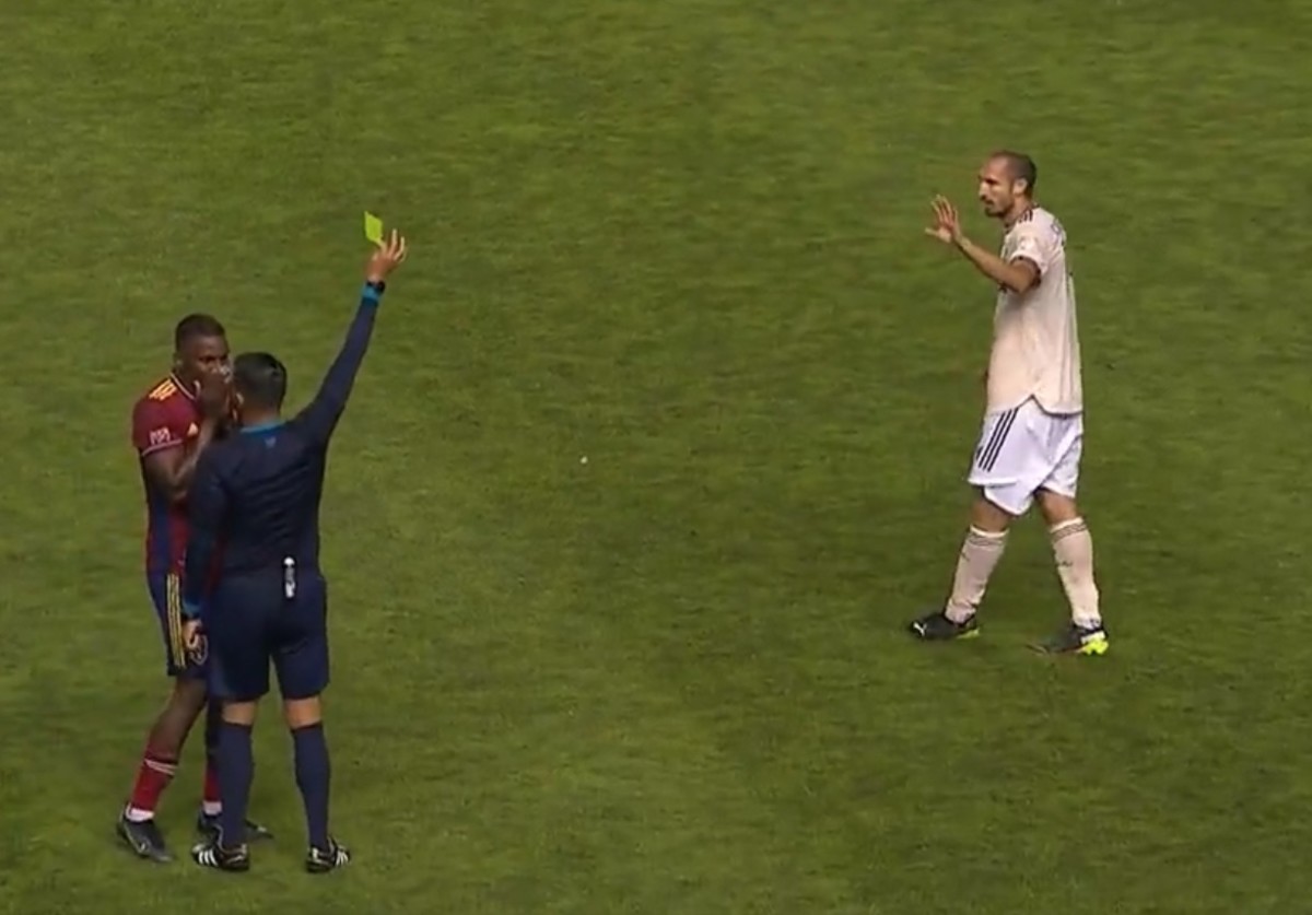 Giorgio Chiellini (right) pictured receiving the first yellow card of his MLS career during LAFC's 4-1 win at Real Salt Lake in August 2022